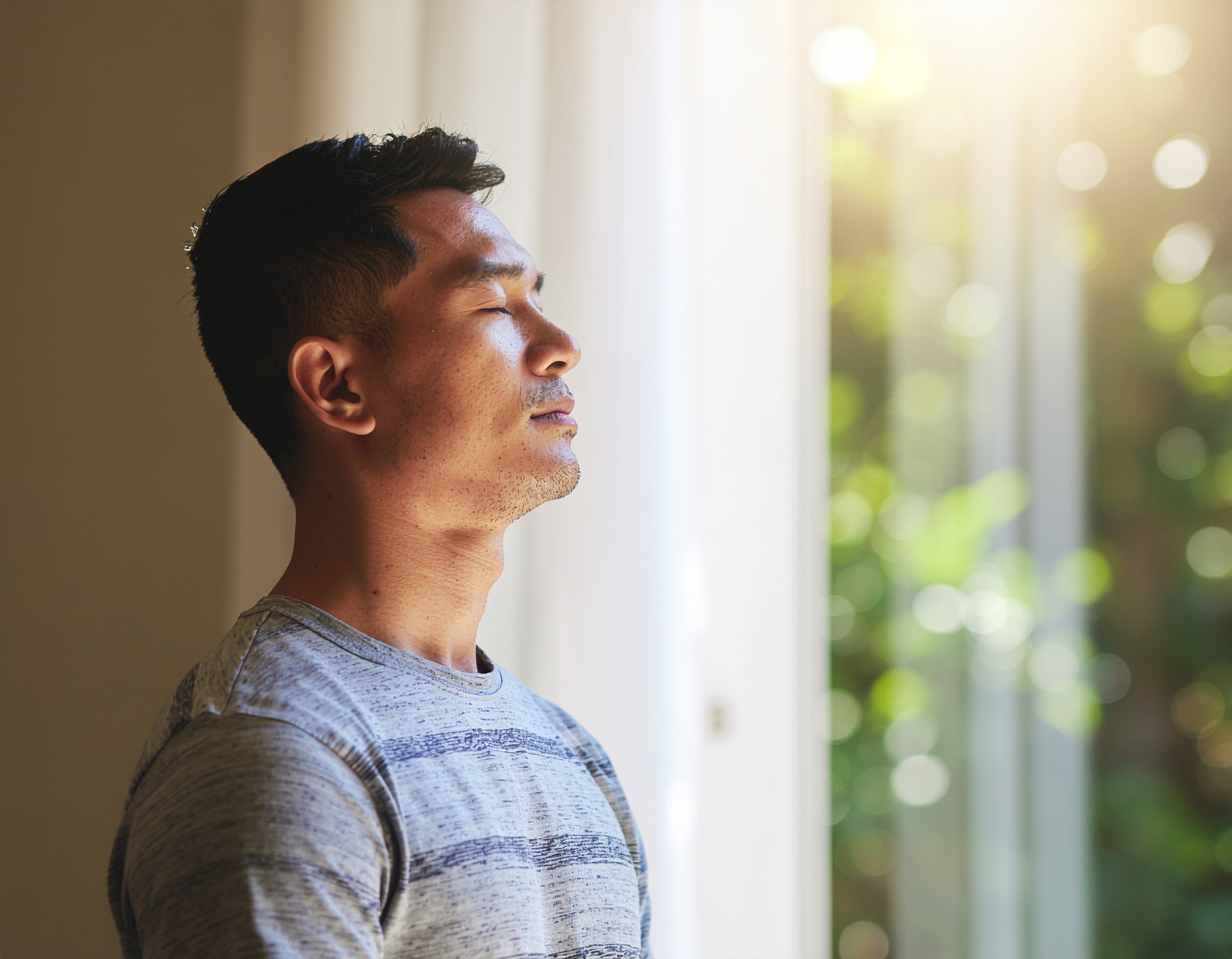 Man in Profile with Closed Eyes in Soft Natural Light